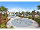 Community splash pad with playful water features and tropical landscaping at 11854 Lake Lucaya Dr, Riverview, FL 33579
