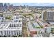 Expansive aerial view showcasing the cityscape, complete with pools and recreational spaces between buildings at 1208 E Kennedy Blvd # 1125, Tampa, FL 33602