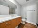 Bright bathroom with a large mirror, modern sink, and a glass-enclosed shower for a luxurious experience at 1208 E Kennedy Blvd # 1125, Tampa, FL 33602