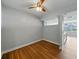 Inviting bedroom area showcasing wood floors, natural light, and an open layout, creating a serene living space at 1208 E Kennedy Blvd # 1125, Tampa, FL 33602