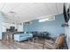 Resident clubhouse with a kitchen, lounging, and seating area at 1208 E Kennedy Blvd # 1125, Tampa, FL 33602