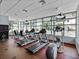 Bright gym with treadmills, weights, and fitness equipment at 1208 E Kennedy Blvd # 1125, Tampa, FL 33602