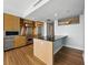 Gourmet kitchen with stainless steel appliances and island with breakfast bar at 1208 E Kennedy Blvd # 1125, Tampa, FL 33602