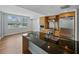 Bright, modern kitchen featuring stainless steel appliances, island, and wood cabinets at 1208 E Kennedy Blvd # 1125, Tampa, FL 33602
