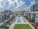 Stunning rooftop pool with lounge seating and views of the city skyline at 1208 E Kennedy Blvd # 1125, Tampa, FL 33602