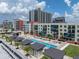 Resort-style pool with lounge seating and lush landscaping at 1208 E Kennedy Blvd # 1125, Tampa, FL 33602