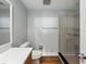 Stylish bathroom with a tiled shower and glass door, complemented by modern fixtures and a sleek design at 1208 E Kennedy Blvd # 1125, Tampa, FL 33602
