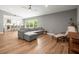 Comfortable living space featuring an open layout with views of the kitchen and backyard at 12217 Snead Pl, Tampa, FL 33624