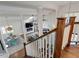Open-concept living space with a fireplace, dining area, and lots of natural light at 1326 Moss Dr, Dunedin, FL 34698