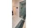 Bathroom featuring a glass shower with tiled walls and a clean, well-lit space at 14324 Bronte Ct, Hudson, FL 34667