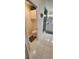 Bright bathroom features a toilet, a walk-in shower, and a white vanity at 14324 Bronte Ct, Hudson, FL 34667