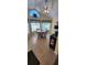 Sunlit breakfast nook with arched window and tile flooring at 14324 Bronte Ct, Hudson, FL 34667