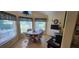 Bright breakfast nook with multiple windows and a view of the backyard at 14324 Bronte Ct, Hudson, FL 34667