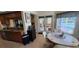 Open kitchen and breakfast nook with access to the pool area at 14324 Bronte Ct, Hudson, FL 34667