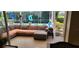 Relaxing lanai area with comfortable seating and view of the pool at 14324 Bronte Ct, Hudson, FL 34667