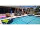 Inviting pool and spa with poolside furniture and outdoor grill perfect for entertaining or relaxation at 14324 Bronte Ct, Hudson, FL 34667