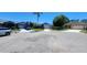 Street view of well-kept homes with manicured lawns and lush landscaping on a sunny day at 14324 Bronte Ct, Hudson, FL 34667