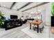 Open floor plan seamlessly connects living, dining, and kitchen areas at 148 Mossy River Ct, Brandon, FL 33511