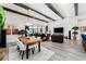 Open floor plan seamlessly connects dining and living area with views of the pool at 148 Mossy River Ct, Brandon, FL 33511