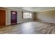 Inviting living room with large window and new flooring at 1516 Lemon St, Clearwater, FL 33756