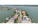 Aerial view highlighting the neighborhood, waterfront location, and boating access from the community at 17382 Kennedy Dr, North Redington Beach, FL 33708