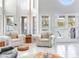 Bright living room featuring french doors with waterfront view at 17382 Kennedy Dr, North Redington Beach, FL 33708