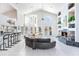 Spacious living room boasting an open floor plan, high ceilings, and elegant fireplace at 17382 Kennedy Dr, North Redington Beach, FL 33708