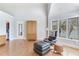 Spacious bedroom featuring a comfortable seating area and windows with views at 17382 Kennedy Dr, North Redington Beach, FL 33708