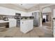 Well-equipped kitchen featuring stainless steel appliances, a kitchen island and ample counter space at 1751 Split Fork Dr, Oldsmar, FL 34677