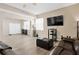Open living room area featuring luxury vinyl floors, neutral walls, and plenty of natural light at 1751 Split Fork Dr, Oldsmar, FL 34677