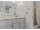 Brightly lit bathroom features a single sink vanity and walk-in shower at 1800 Mariner Dr # 2, Tarpon Springs, FL 34689