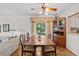 Traditional dining room featuring parquet floors, and elegant wood table and chairs at 1800 Mariner Dr # 2, Tarpon Springs, FL 34689
