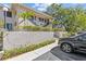 Inviting two-story condo featuring well-maintained landscaping and private entrances at 1800 Mariner Dr # 2, Tarpon Springs, FL 34689