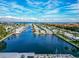 Aerial view of a waterfront community with canal access and manicured landscapes at 18675 Us Highway 19 N # 140, Clearwater, FL 33764