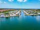Scenic aerial view of the waterfront homes, showcasing the canal and surrounding community at 18675 Us Highway 19 N # 140, Clearwater, FL 33764