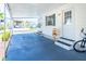 Home exterior with covered parking and a well maintained yard creating a welcoming environment for residents at 18675 Us Highway 19 N # 140, Clearwater, FL 33764