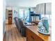 Cozy living room with coastal decor, wood-look floors, and comfortable seating at 18675 Us Highway 19 N # 140, Clearwater, FL 33764