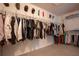 Large walk-in closet with ample storage space for clothing and accessories at 1916 River Crossing Dr, Valrico, FL 33596