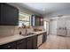 Modern kitchen features stainless steel appliances, updated cabinets, and plenty of counter space at 1916 River Crossing Dr, Valrico, FL 33596