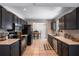 Well-equipped kitchen with stainless steel appliances and ample cabinet space, seamlessly connecting to the dining area at 1916 River Crossing Dr, Valrico, FL 33596