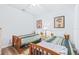 Bright guest bedroom featuring two twin beds and neutral paint at 2150 River Turia Cir, Riverview, FL 33578