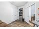 Bonus room with hardwood-style floors, closet and open doorway at 2150 River Turia Cir, Riverview, FL 33578
