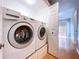 Laundry room with a LG washer and dryer set at 24314 Landing Dr, Lutz, FL 33559