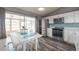Bright kitchen boasts stainless steel appliances, stylish backsplash, and views of the lanai at 2604 Shilo Ct, Valrico, FL 33596