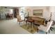 Cozy living room with traditional furnishings, neutral carpet, and ample natural light at 2630 Pearce Dr # 104, Clearwater, FL 33764