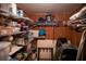 Spacious walk-in closet with wooden paneling and wire shelving for ample storage at 2630 Pearce Dr # 104, Clearwater, FL 33764