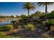 Lush tropical landscaping around the Saddlebrook Resort sign near a tranquil pond at 29909 Baywood Ln, Wesley Chapel, FL 33543