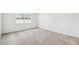 Bright bedroom featuring a window and neutral carpet flooring at 4275 Big Sky Dr, Spring Hill, FL 34604
