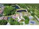 Expansive aerial view of the neighborhood, showcasing lush landscaping and serene ponds at 4503 Lace Cascade Ct, Lutz, FL 33558