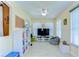 Inviting living area with ample natural light, a ceiling fan, and a cozy beanbag chair at 4503 Lace Cascade Ct, Lutz, FL 33558